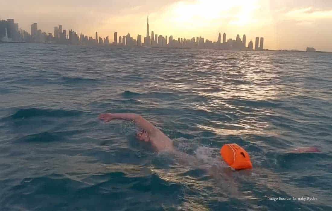 British teen swimmer Barnaby Ryder completed a 27km swim around The World Islands in Dubai, setting a new endurance milestone.