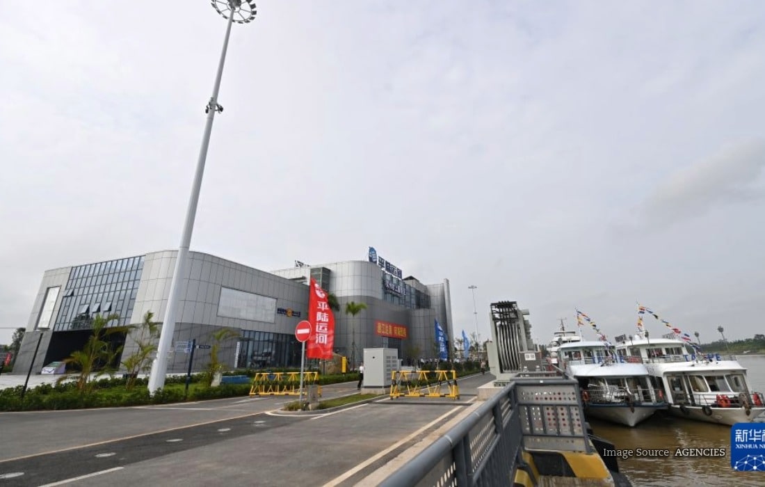 Cargo vessels travelling through the newly opened Pinglu Canal in Guangxi, China.