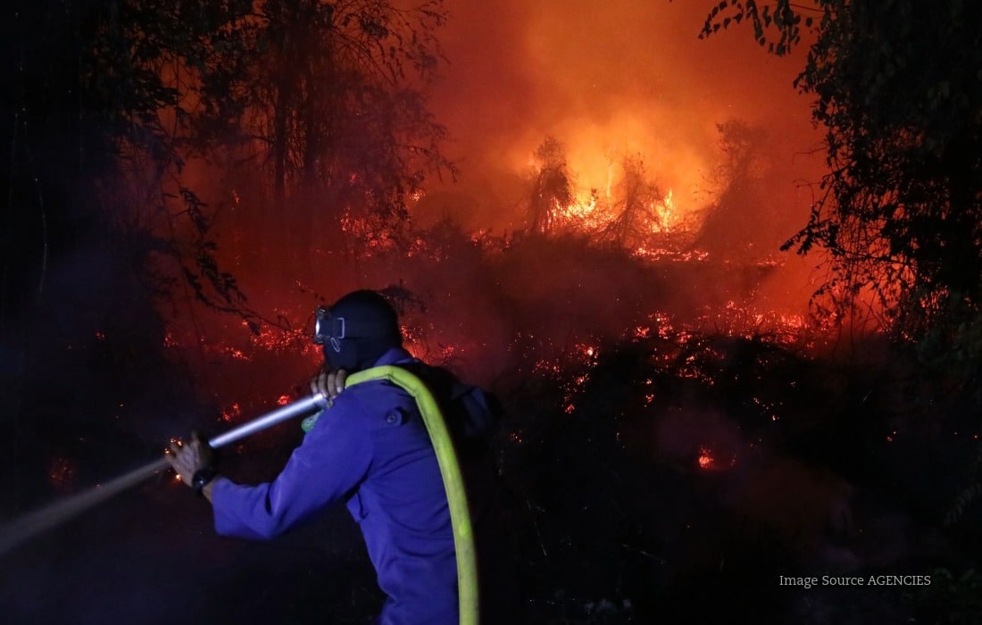 Firefighters tackle forest and land fires in Indonesia during the country’s most intense wildfire season in 11 years.