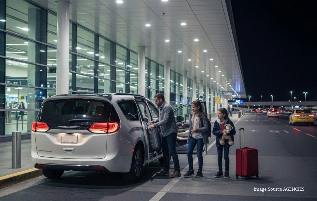 Traveller loading luggage into a car after arriving at a UAE airport following a long-haul flight.
