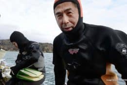 Japanese man continues underwater search for wife lost in 2011 tsunami