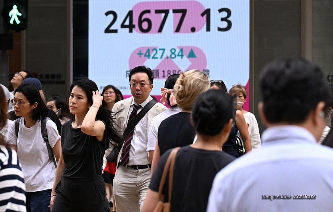 Asian stock market display showing share prices ahead of the US Federal Reserve interest-rate decision.