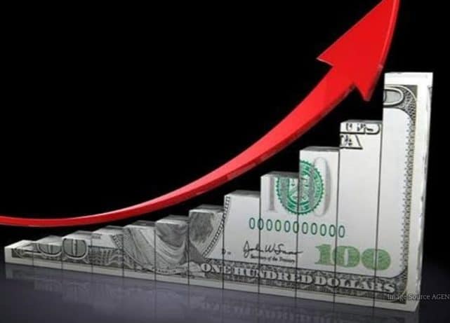 US dollar banknotes representing the dollar’s rise to a near two-week high ahead of the Federal Reserve rate decision.