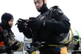 Japanese man continues underwater search for wife lost in 2011 tsunami