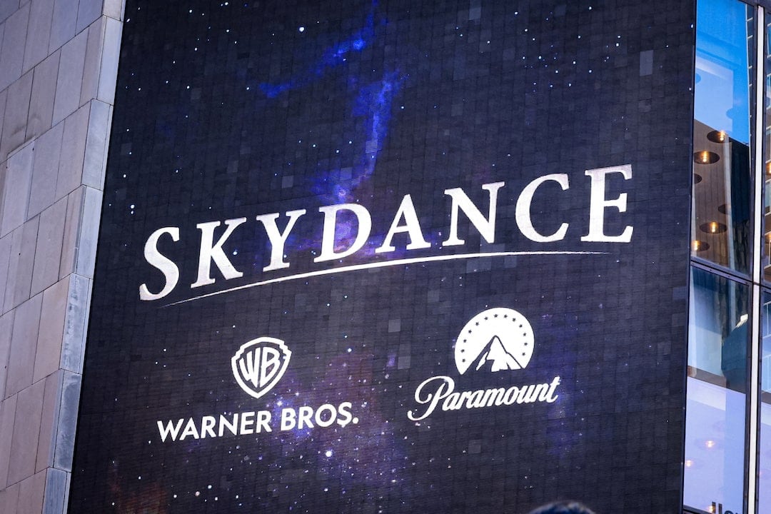 Paramount and Warner Bros. Discovery logos representing the completed Skydance merger and its impact on streaming services.