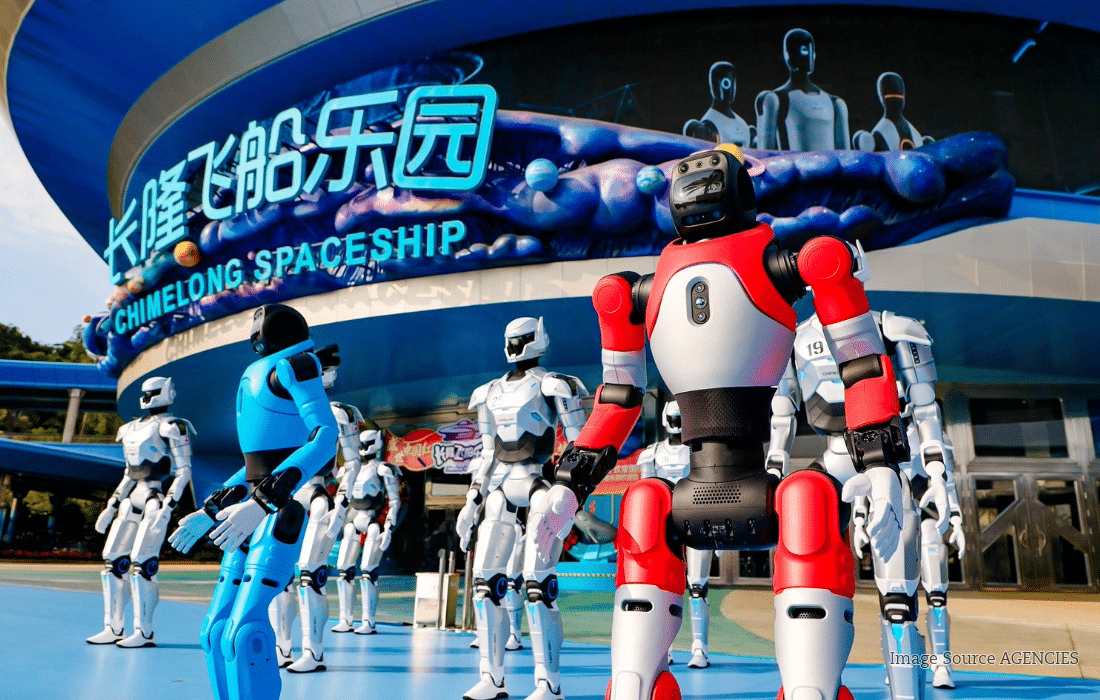 Humanoid robots interacting with visitors at Chimelong Spaceship Park in Zhuhai, China.