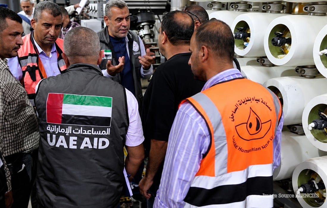 UAE Aid officials and humanitarian workers inspect desalination equipment supporting Gaza water projects.