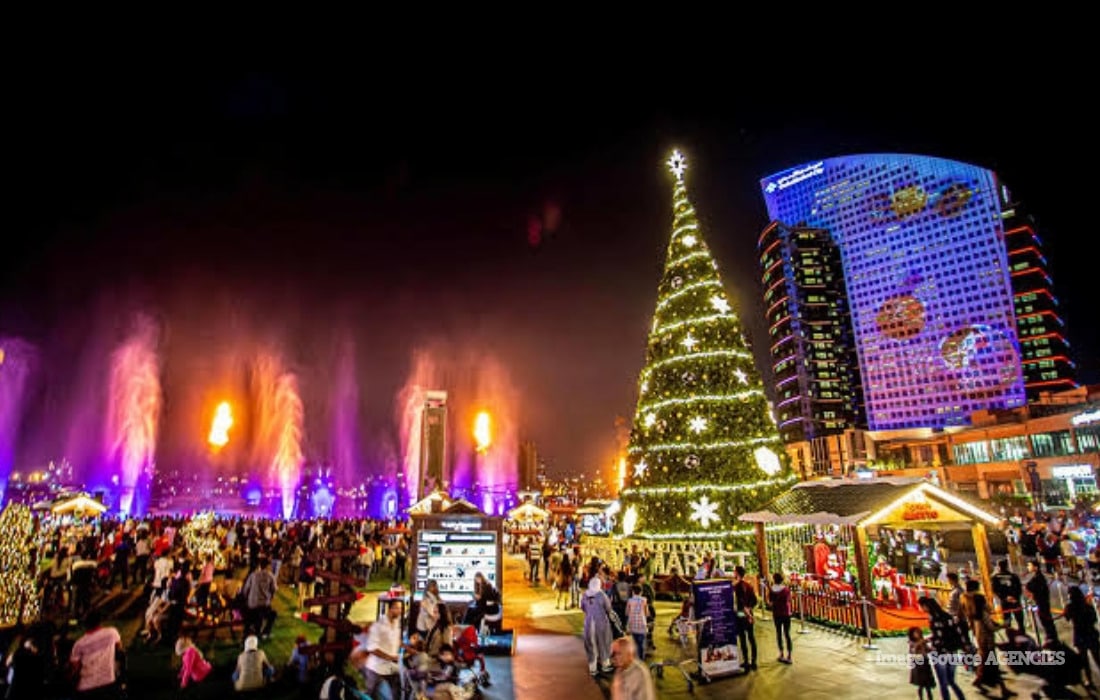 Dubai winter festival Christmas market at Dubai Festival City Mall with festive stalls, lights and family attractions.
