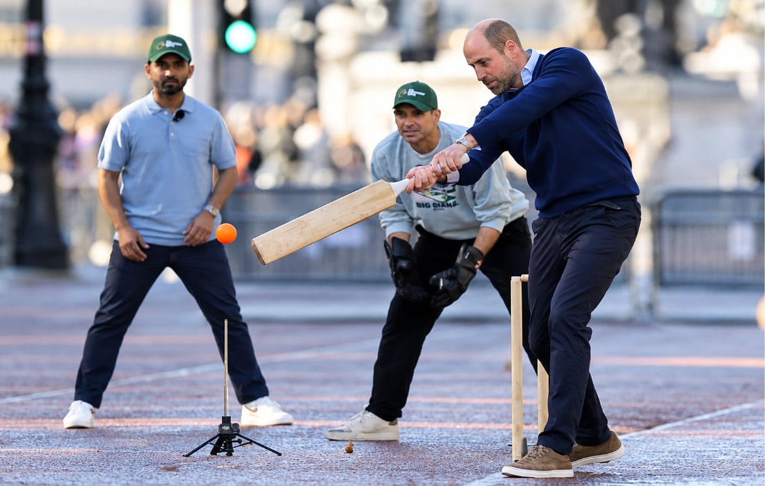 Prince William batting during a street cricket match outside Buckingham Palace in London ahead of the Earthshot Prize ceremony in Mumbai.