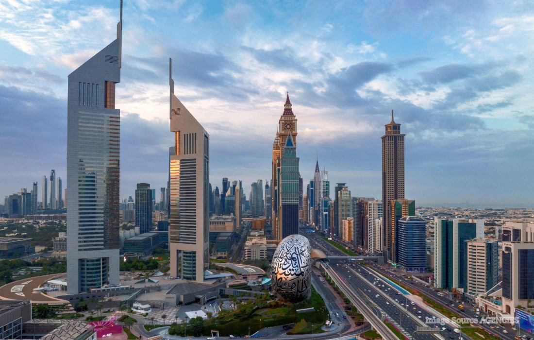 Aerial view of Dubai's skyline and business district as the emirate reports a 2.3% decline in real GDP in H1 2026.