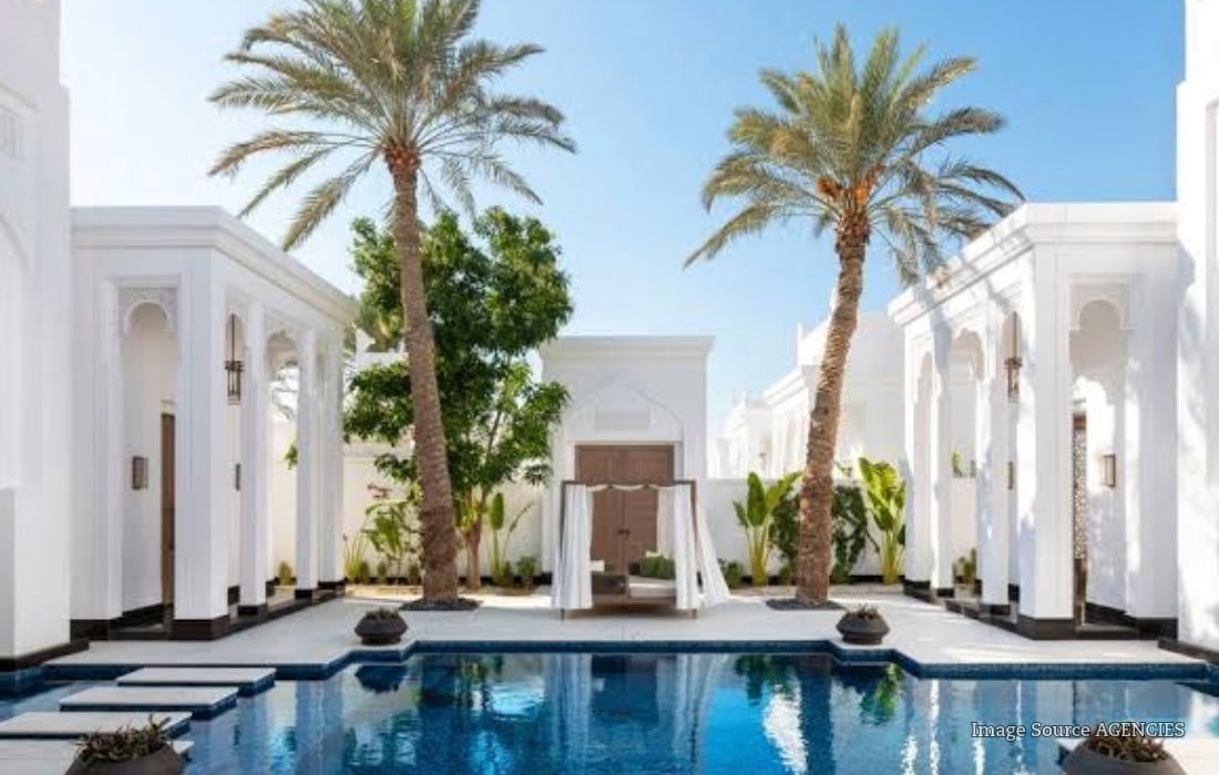 Luxury swimming pool and sun loungers at Cove Beach in Dubai, one of the destinations offering pool day deals in 2026