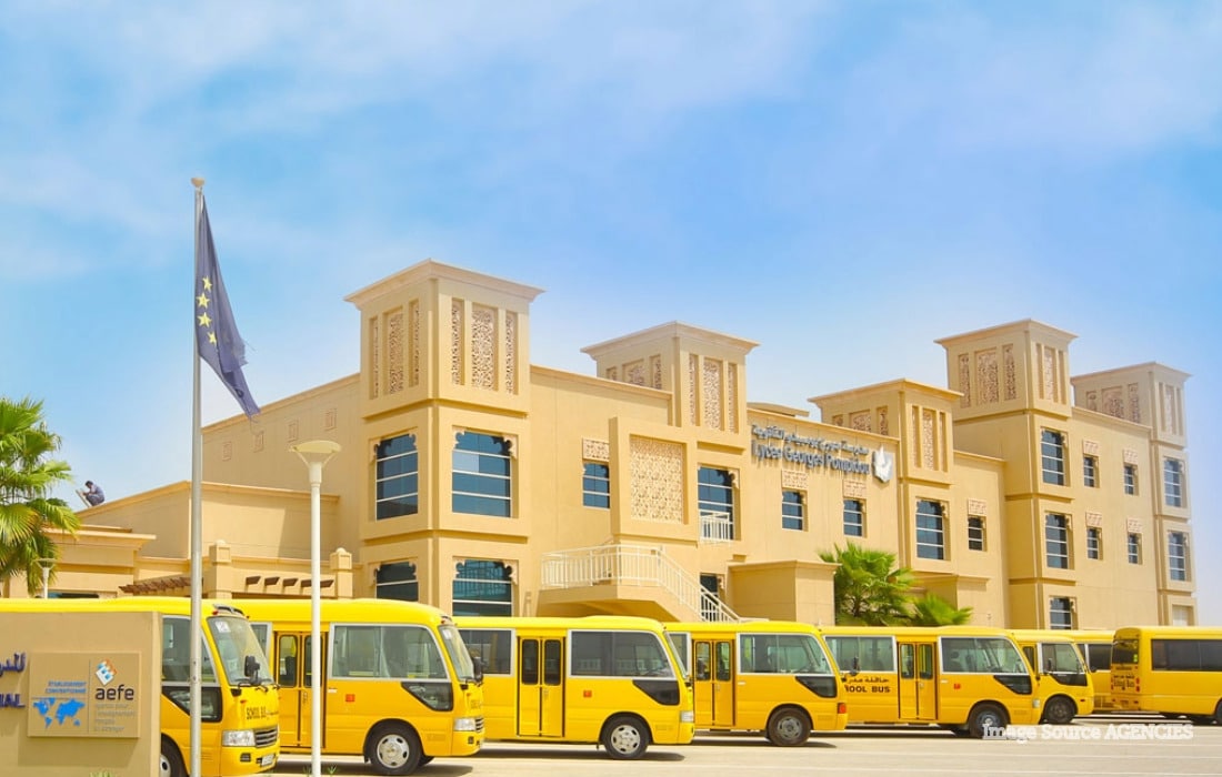 School buses and cars outside a Dubai school as KHDA allows flexible timings to reduce traffic.