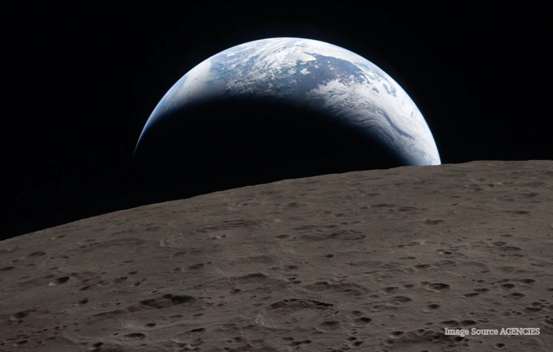 Crescent Earth disappearing behind the Moon during NASA’s Artemis II mission, captured by astronaut Reid Wiseman.
