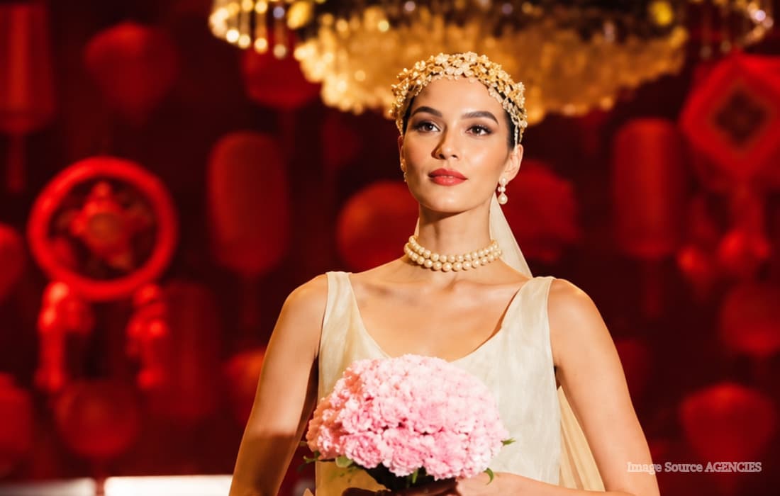 Bea Millan-Windorski wearing a white JC Buendia bridal gown while walking the Red Charity Gala runway.